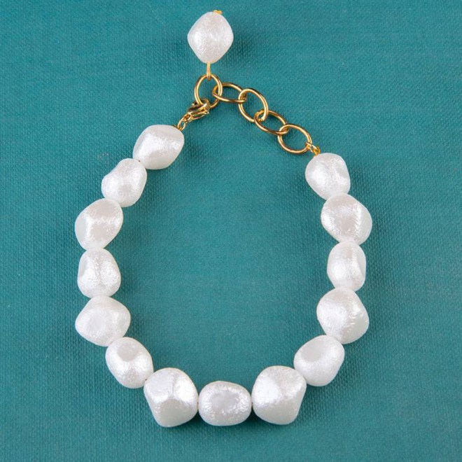 Βραχιόλι με ακρυλικές πέρλες απομίμηση μαργαριταριού και ατσάλινο κούμπωμα