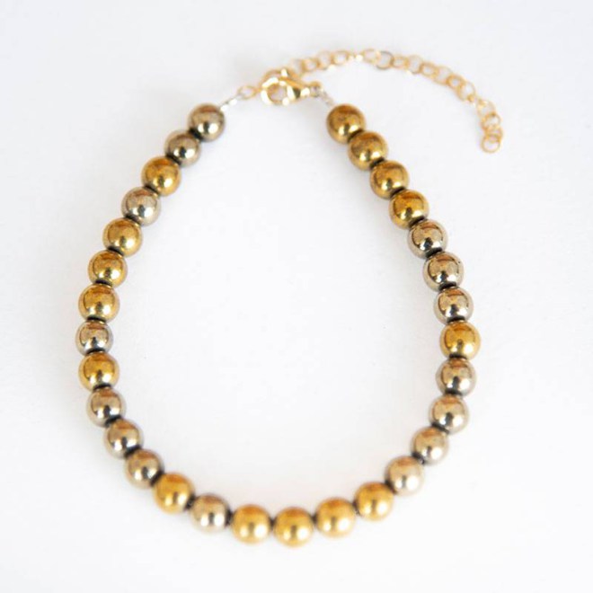 Βραχιόλι με αιματίτη στρόγγυλο σε χρυσό χρώμα και ατσάλινο κούμπωμα